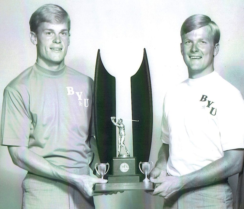 Johnny Miller and Mike Taylor with BYU's national championship tropy.